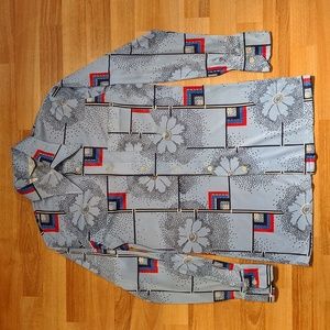 Vintage 70' blue floral and geometric patterned disco shirt by Pegasus
